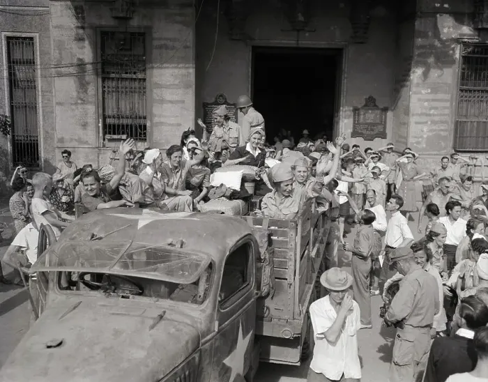 Framed Print : Crowd Standing Around Truck of Female Nurses Framed Print : Crowd Standing Around Truck of Female Nurses