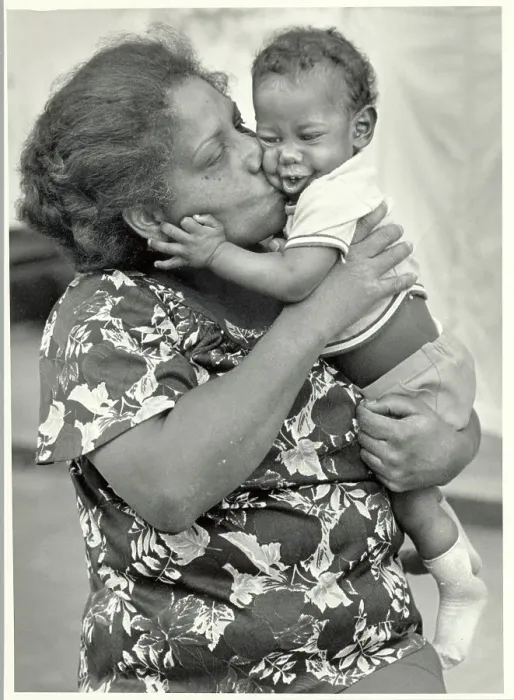 Framed Print : Cuban Grandmother Kissing Her Grandson Framed Print : Cuban Grandmother Kissing Her Grandson