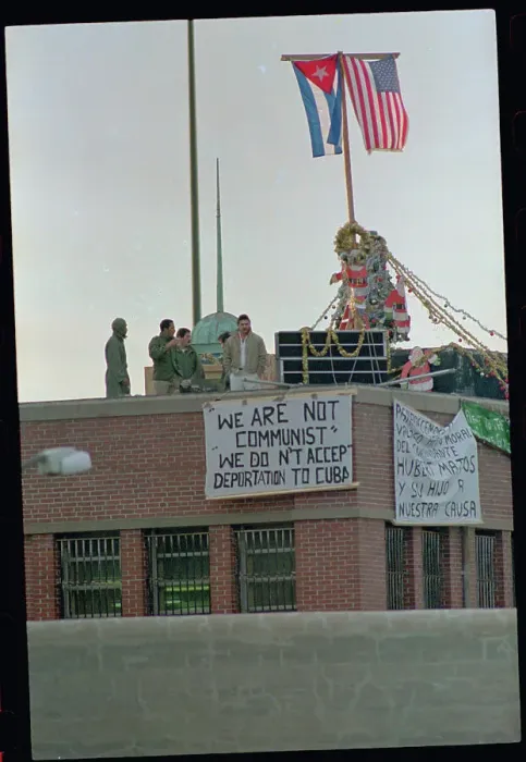 Framed Print : Cuban Inmates Standing on Roof Framed Print : Cuban Inmates Standing on Roof