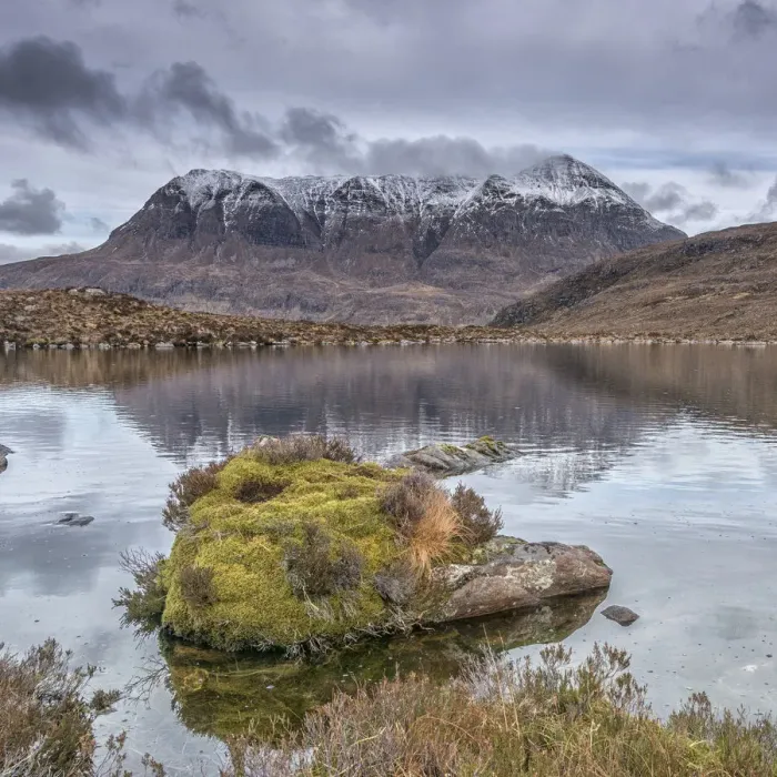 Framed Print : Cul Mor. Scottish mountain reflected in small lochan with foreground vegetation Framed Print : Cul Mor. Scottish mountain reflected in small lochan with foreground vegetation