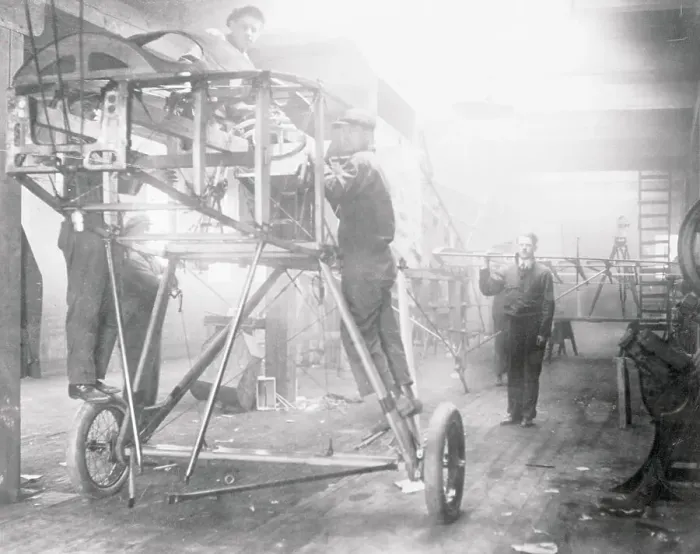 Framed Print : Cuno Rheden Working on Plane