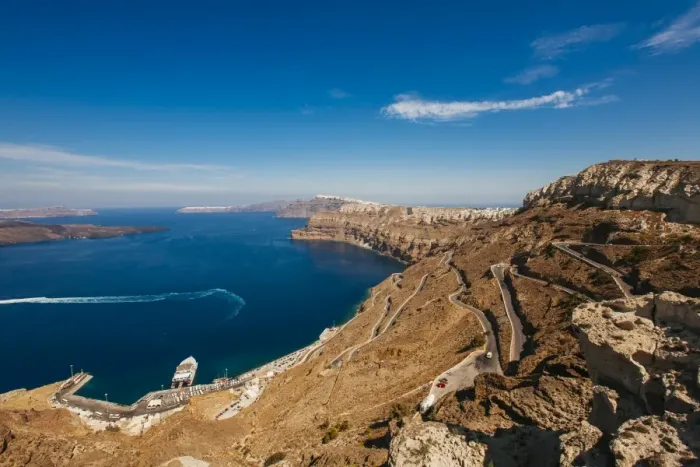 Framed Print : Curved road to Athinios port, Santorini, Greece Framed Print : Curved road to Athinios port, Santorini, Greece