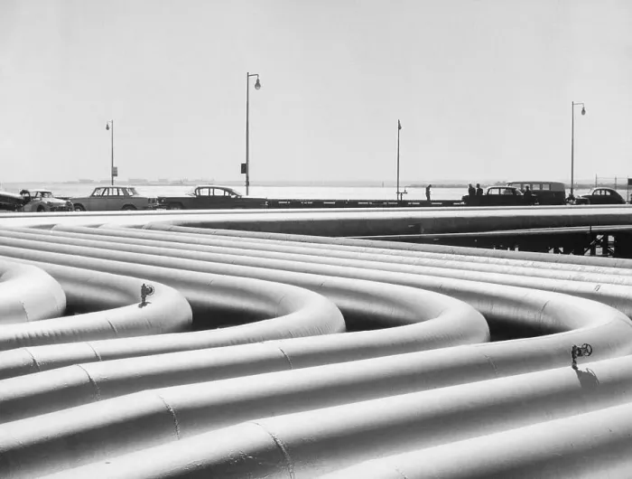 Framed Print : Curving Oil Pipelines
