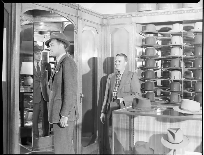Framed Print : Customer and Salesman at Hat Store Framed Print : Customer and Salesman at Hat Store