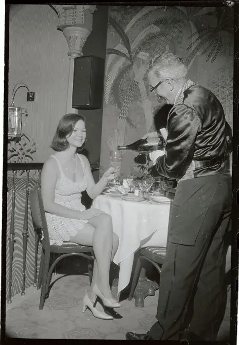 Framed Print : Customer Being Served at El Morocco