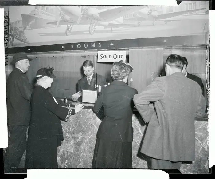 Framed Print : Customers Trying to get Rooms Framed Print : Customers Trying to get Rooms