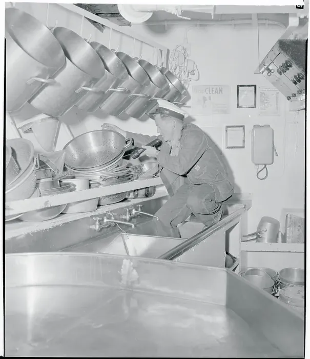 Framed Print : Customs Official Inspecting a Ship's Galley Framed Print : Customs Official Inspecting a Ship's Galley