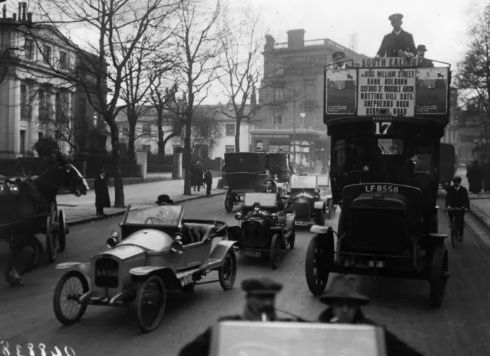 Framed Print : Cycle Car. A demonstration of a cycle car, left, in London Framed Print : Cycle Car. A demonstration of a cycle car, left, in London