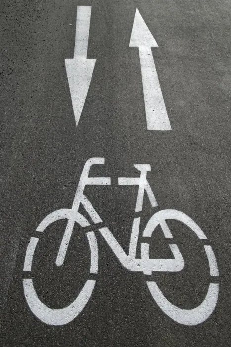 Framed Print : Cycle path, directional arrows, road markings on the asphalt Framed Print : Cycle path, directional arrows, road markings on the asphalt