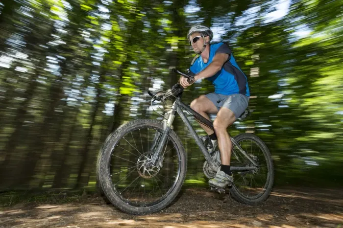 Framed Print : Cyclist on a mountainbike riding through a forest, Schurwald forest, Winterbach, Baden-Wurttemberg, Germany Framed Print : Cyclist on a mountainbike riding through a forest, Schurwald forest, Winterbach, Baden-Wurttemberg, Germany