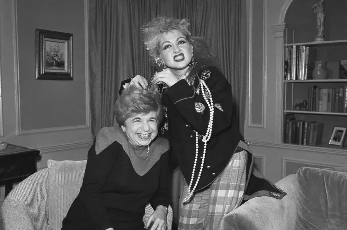 Framed Print : Cyndi Lauper Teasing Doctor Ruth's Hair Framed Print : Cyndi Lauper Teasing Doctor Ruth's Hair