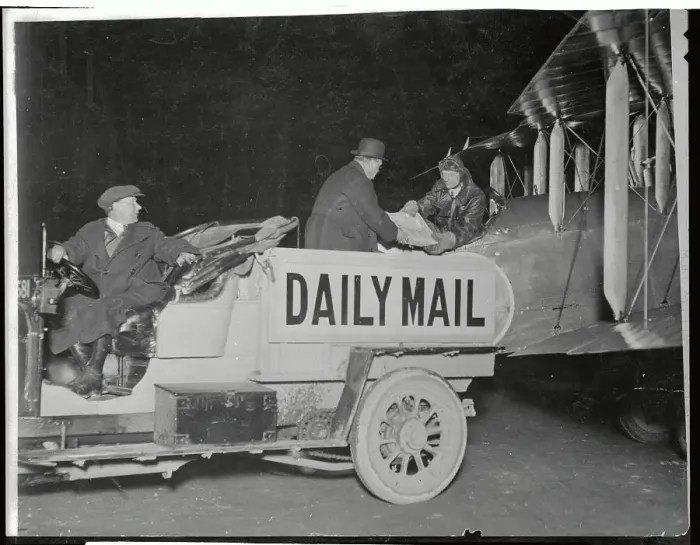 Framed Print : The Daily Mail Newspaper Being Loaded onto Airplane Framed Print : The Daily Mail Newspaper Being Loaded onto Airplane