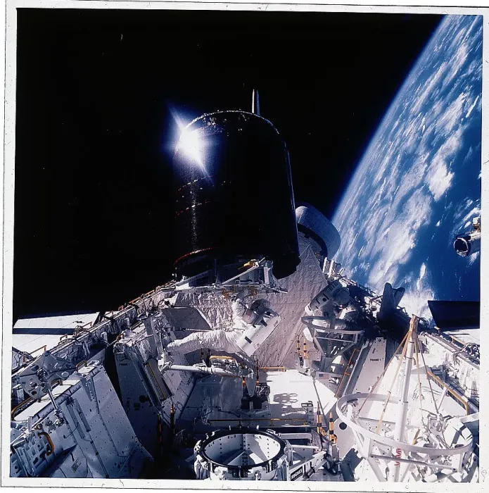 Framed Print : Dale Gardner Works on Satellite in Orbit Framed Print : Dale Gardner Works on Satellite in Orbit