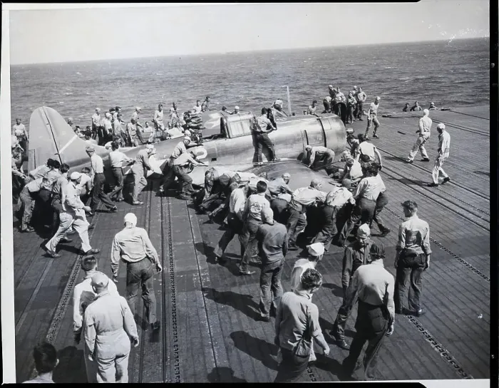 Framed Print : Damaged Dive Bomber on Aircraft Carrier Deck Framed Print : Damaged Dive Bomber on Aircraft Carrier Deck