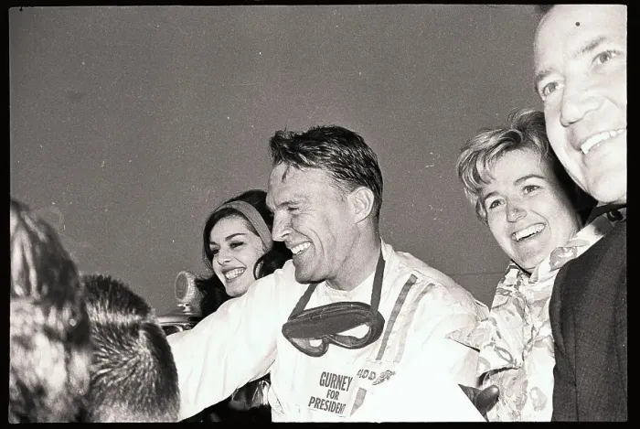 Framed Print : Dan Gurney Celebrating After Winning a Race Framed Print : Dan Gurney Celebrating After Winning a Race