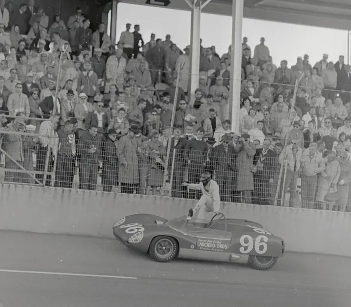 Framed Print : Dan Gurney Climbing into His Race Car Framed Print : Dan Gurney Climbing into His Race Car