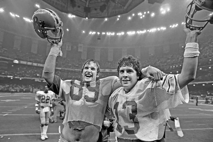 Framed Print : Dan Marino and John Brown Celebrate During Football Game Framed Print : Dan Marino and John Brown Celebrate During Football Game