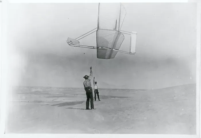 Framed Print : Dan Tate and Wilbur Wright Flying Glider Like a Kite Framed Print : Dan Tate and Wilbur Wright Flying Glider Like a Kite