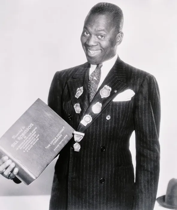 Framed Print : Dancer Bill Robinson with His New Bound Movie Book Framed Print : Dancer Bill Robinson with His New Bound Movie Book