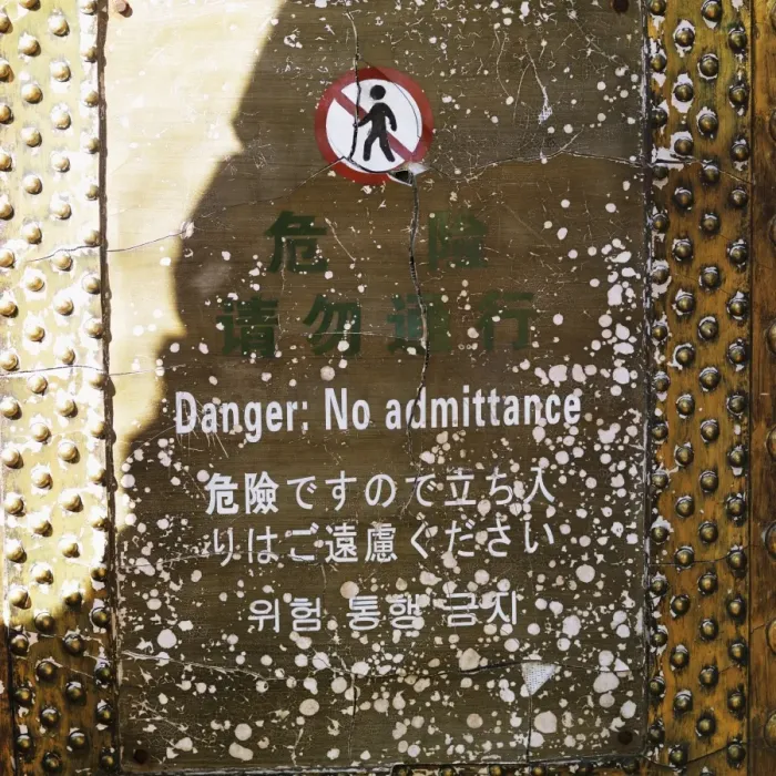 Framed Print : danger sign at mutianyu section of the great wall of china