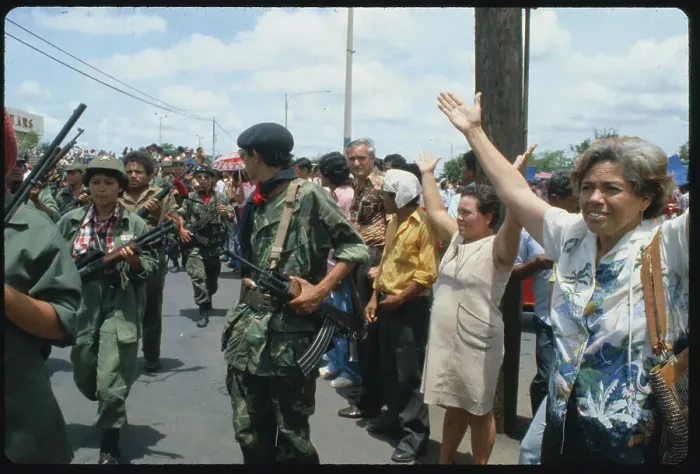 Framed Print : Daniel Ortega Marching with Demonstrators