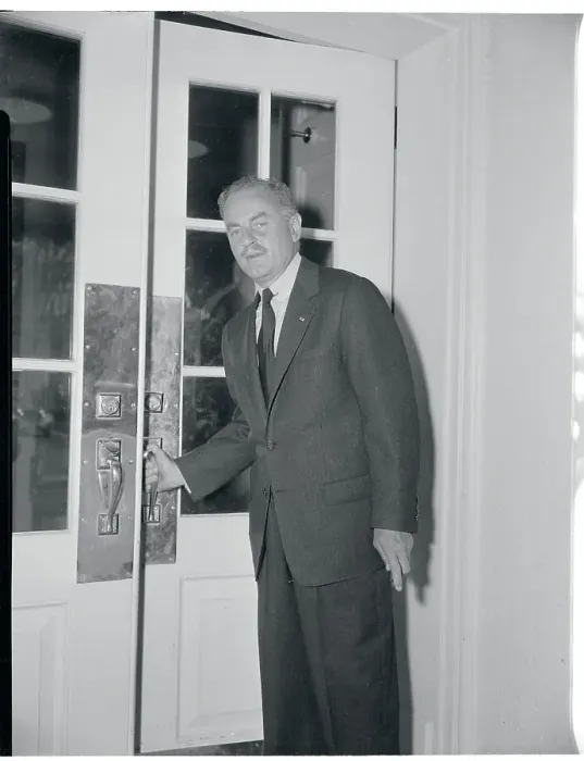 Framed Print : Darryl Zanuck Grasping a Door Handle Framed Print : Darryl Zanuck Grasping a Door Handle