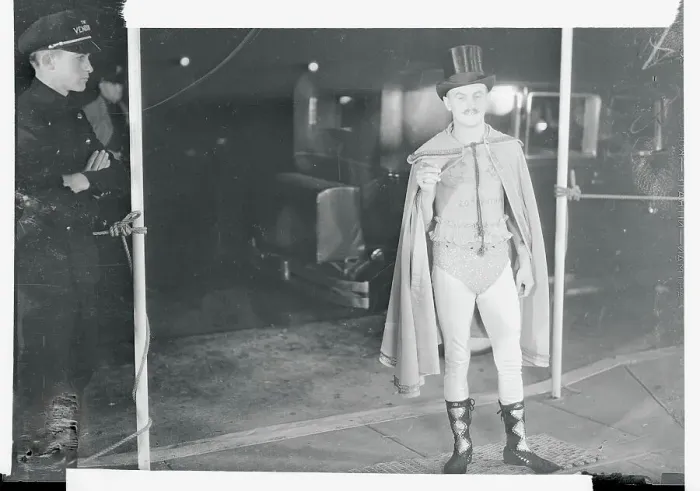 Framed Print : Daryl Zanuck Wearing Caped Outfit near Doorman Framed Print : Daryl Zanuck Wearing Caped Outfit near Doorman