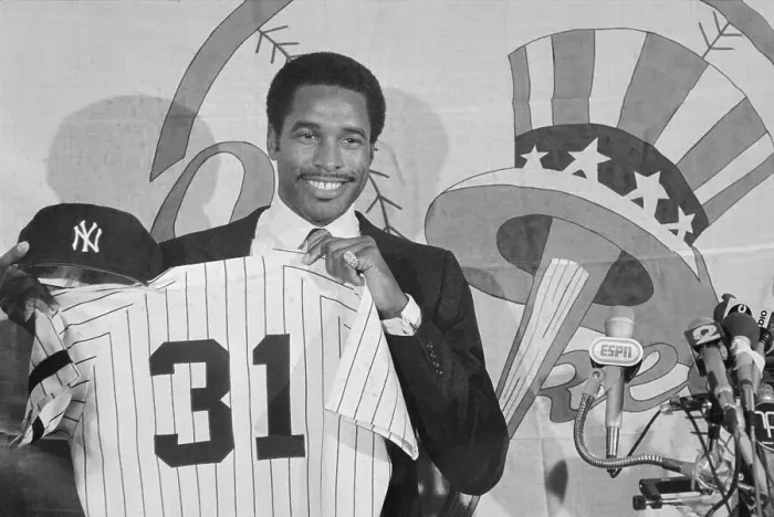 Framed Print : Dave Winfield Holding Shirt and Cap Framed Print : Dave Winfield Holding Shirt and Cap