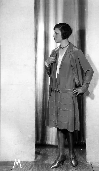 Day Suit. 21st January 1928: A model wearing a womans one piece day suit