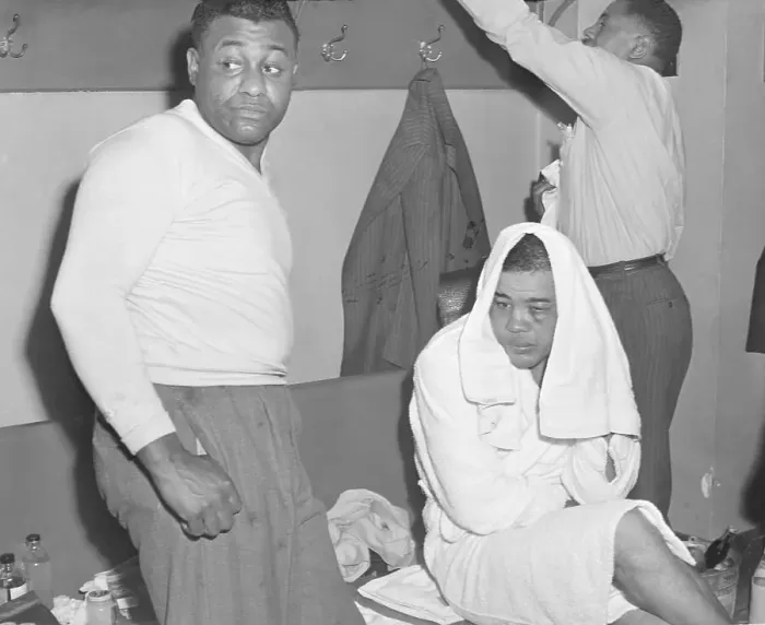 Framed Print : Dazed Joe Louis Seated in Dressing Room Framed Print : Dazed Joe Louis Seated in Dressing Room