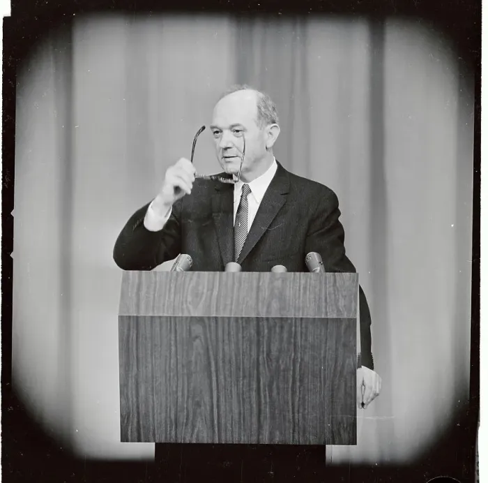 Framed Print : Dean Rusk Holding Eyeglasses at Podium Framed Print : Dean Rusk Holding Eyeglasses at Podium