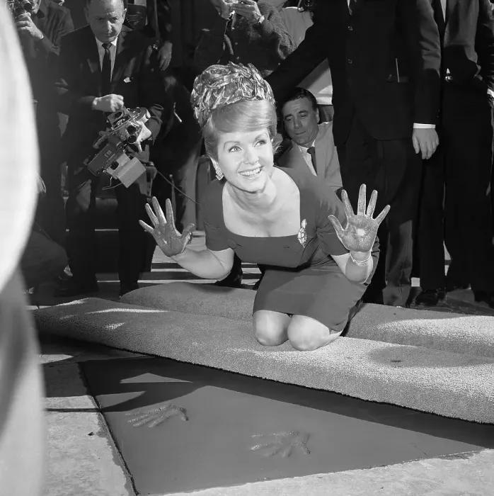 Framed Print : Debbie Reynolds Pressing Hands into Cement Framed Print : Debbie Reynolds Pressing Hands into Cement