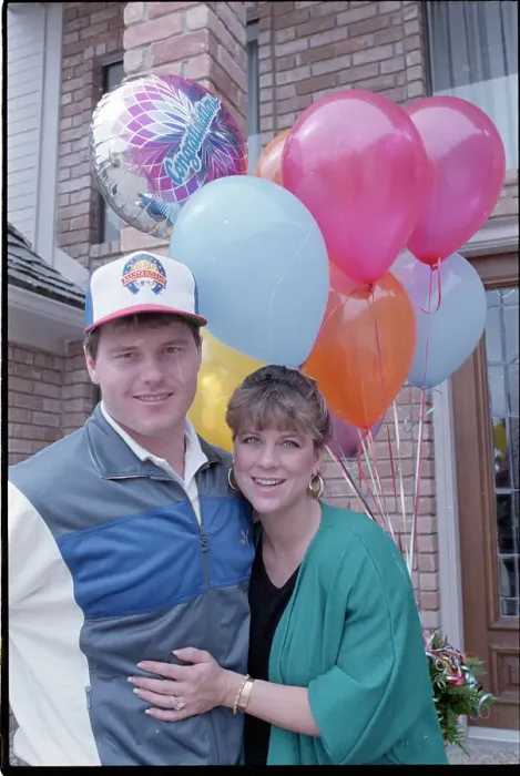 Framed Print : Debbie and Roger Clemens Hug with Balloons Framed Print : Debbie and Roger Clemens Hug with Balloons