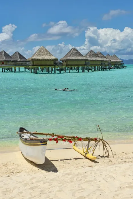 Framed Print : Decorated outrigger boat in front of overwater bungalows, Bora Bora, French Polynesia Framed Print : Decorated outrigger boat in front of overwater bungalows, Bora Bora, French Polynesia