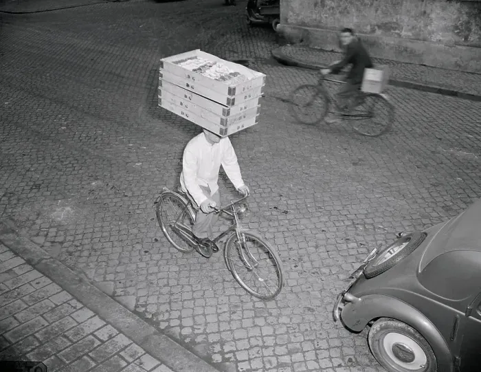 Framed Print : Delivery Boy Riding Bicycle with Box on Head Framed Print : Delivery Boy Riding Bicycle with Box on Head