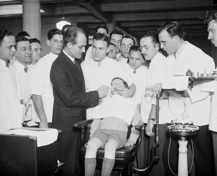 Framed Print : Dental Students Watching a Demonstration Framed Print : Dental Students Watching a Demonstration
