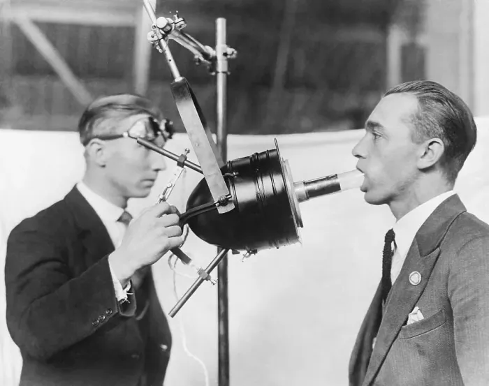 Framed Print : Dentist Demonstrating Artificial Sunlight Lamp on Patient Framed Print : Dentist Demonstrating Artificial Sunlight Lamp on Patient