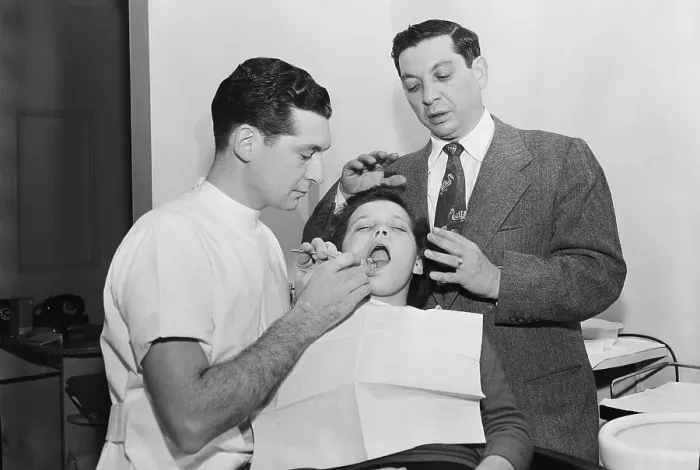 Framed Print : Dentist Working on Patient Framed Print : Dentist Working on Patient