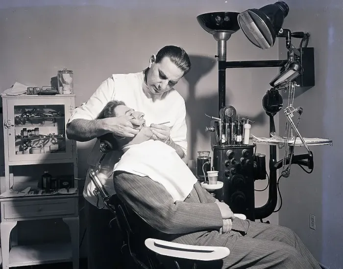 Framed Print : Dentist Working On Patient Framed Print : Dentist Working On Patient