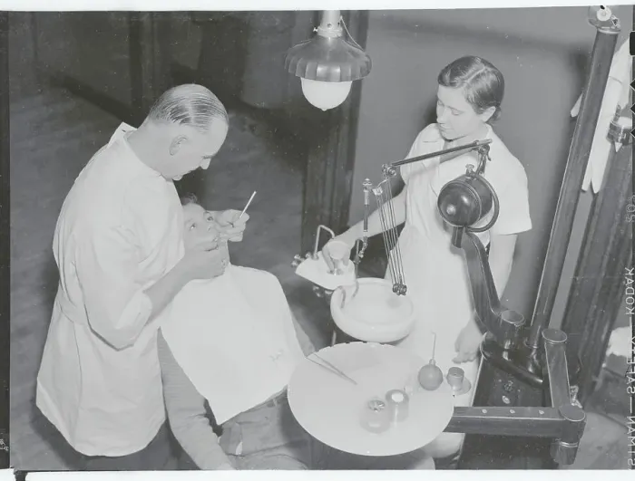 Framed Print : Dentists Working on Patient Framed Print : Dentists Working on Patient