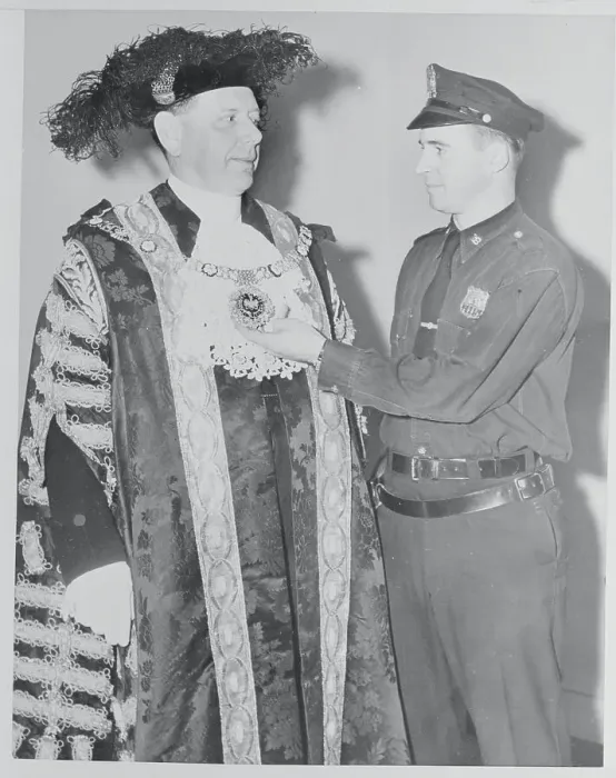 Framed Print : Denys Lowson Wearing Elaborate Robe Talks With Policeman Framed Print : Denys Lowson Wearing Elaborate Robe Talks With Policeman