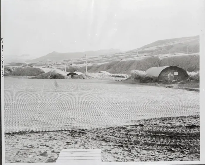 Framed Print : Deserted. Steel matting runways of this advanced Alaskan Airfield stretch emptily Framed Print : Deserted. Steel matting runways of this advanced Alaskan Airfield stretch emptily