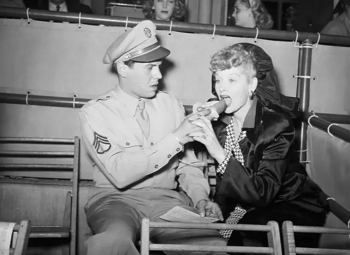 Framed Print : Desi Arnaz Gives Lucille Ball a Bite of Hot Dog Framed Print : Desi Arnaz Gives Lucille Ball a Bite of Hot Dog