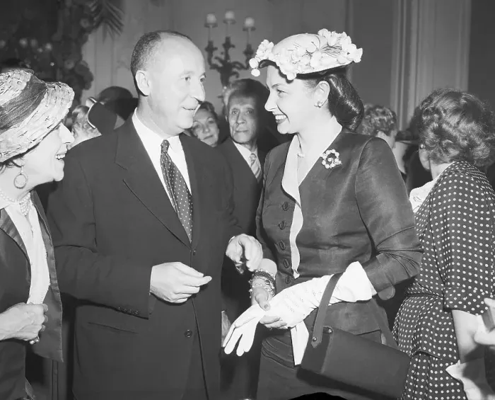 Framed Print : Designer Christian Dior Attending Fashion Show Party Framed Print : Designer Christian Dior Attending Fashion Show Party