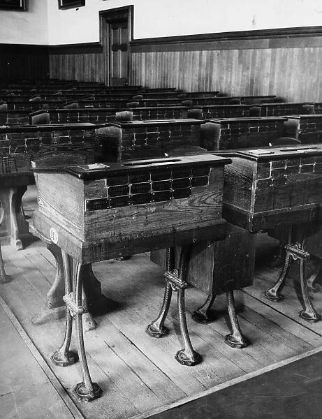 My Desk. Desks with scholars names on plaques in a classrom at Stoneyhurst College