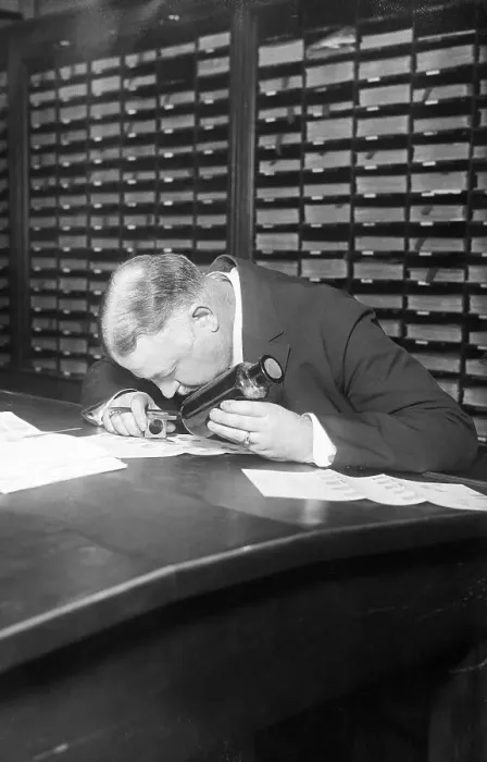 Framed Print : Detective Faurot Examining Fingerprints Framed Print : Detective Faurot Examining Fingerprints