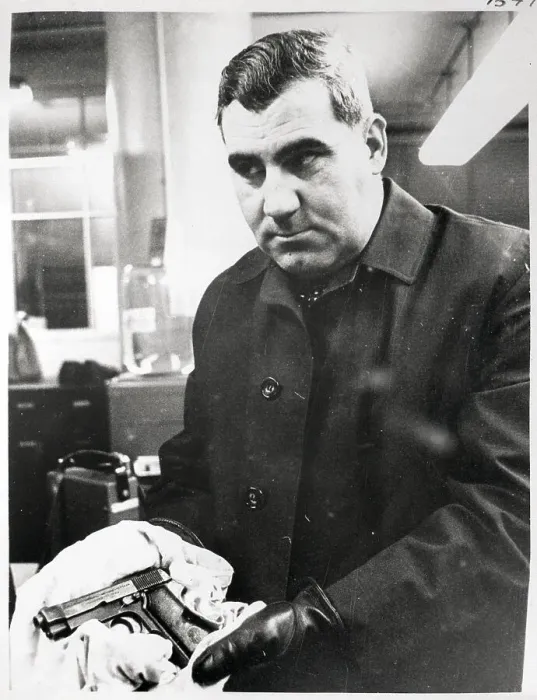 Framed Print : Detective Holds Boston Stranglers Gun Framed Print : Detective Holds Boston Stranglers Gun