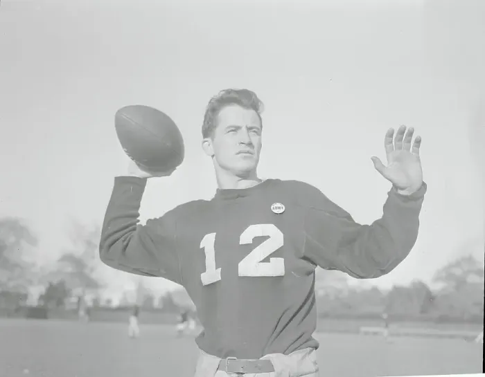 Framed Print : Dick Doheny Throwing Football