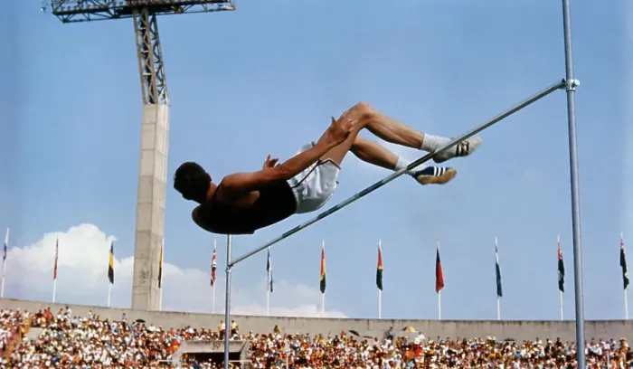 Framed Print : Dick Fosbury Sailing over Bar at 1968 Olympic Games Framed Print : Dick Fosbury Sailing over Bar at 1968 Olympic Games