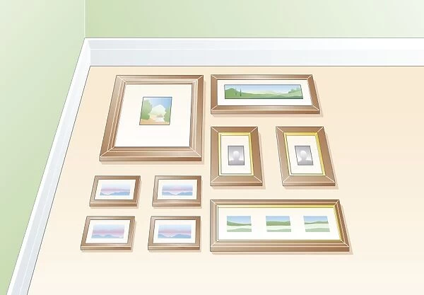 Digital illustration of pictures laid out on floor before attaching to wall